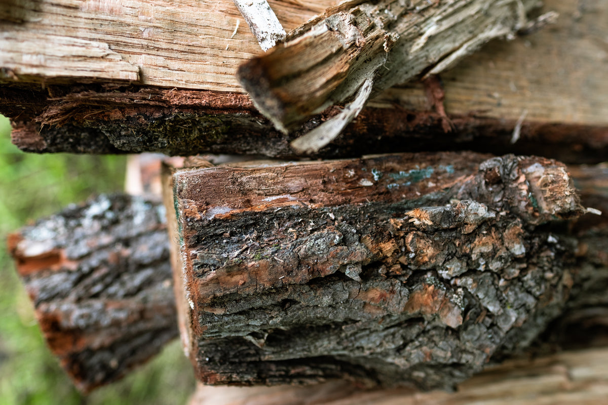 Stacked timber showing natural grain variation